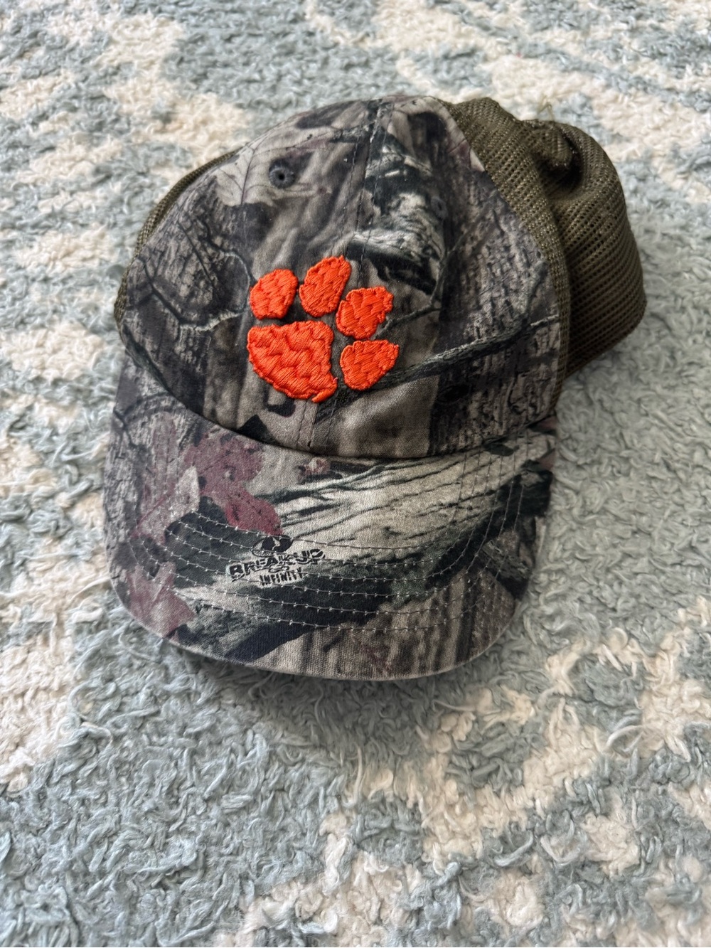 Kids Camouflage Trucker Hat with Orange Paw Embroidery